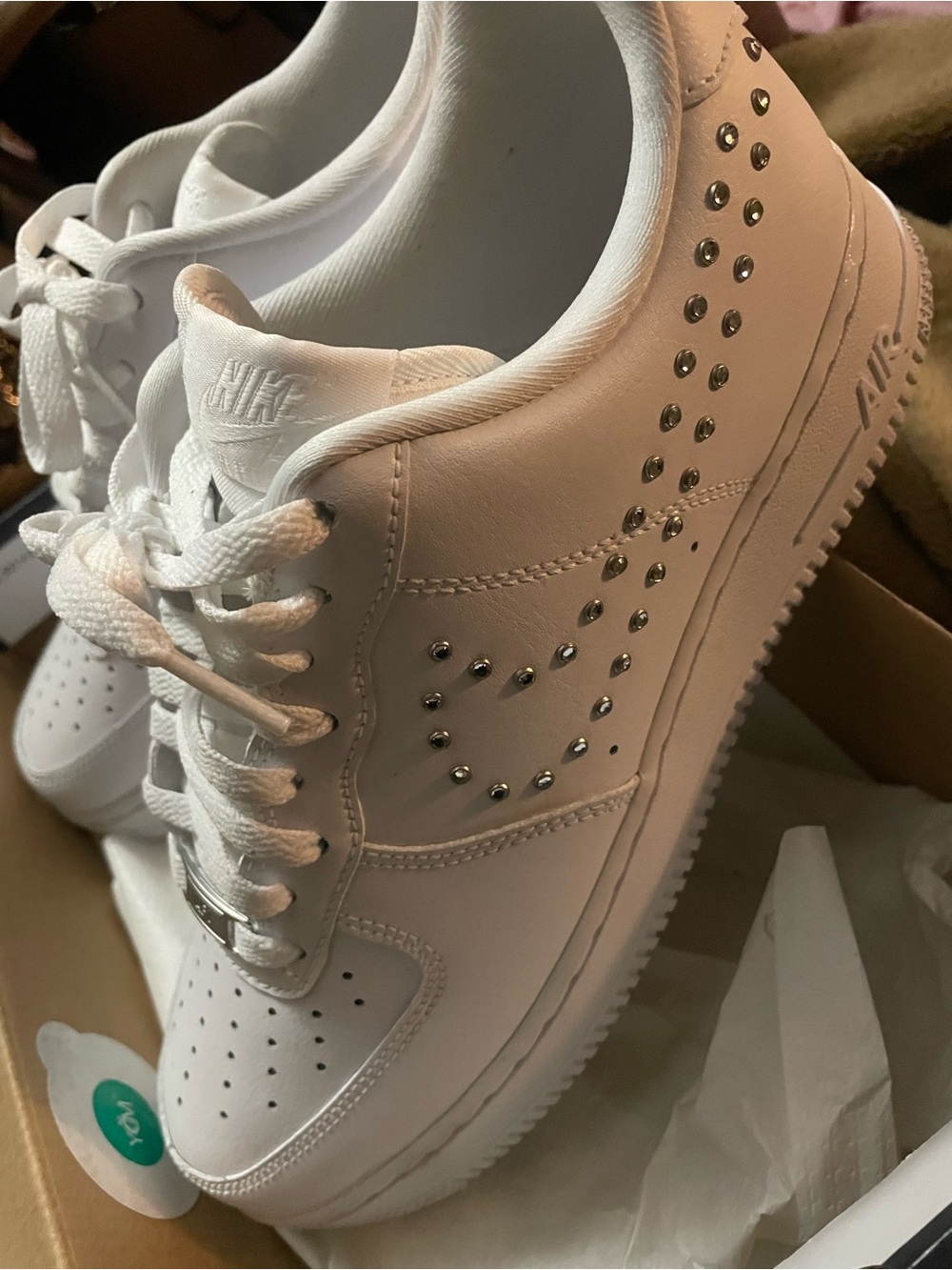 Nike Women’s White Leather Sneakers with Silver Stud Accents